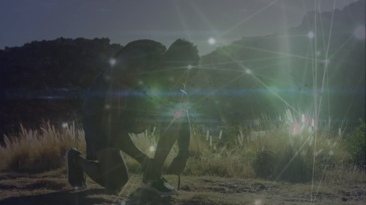 아프리카계 미국인 한 남자가 야외에서 신발을 는 연결망의 반이는 애니메이션