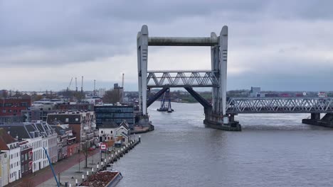 truss steel railway bridge opening, floating crane and escort vessel