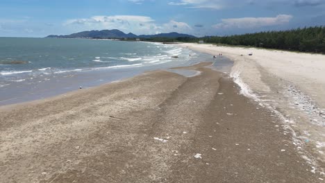 aerial view dolly of the secret beach and the mountains in vung tau