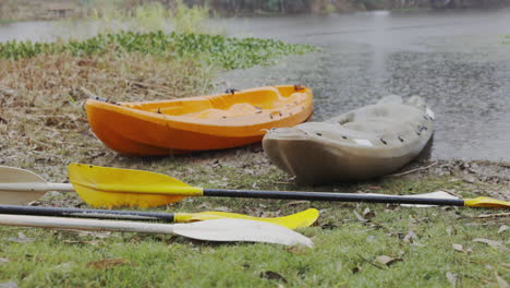 Kayak-boat,-rain-and-nature-with-adventure