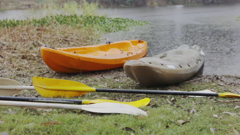 kayak boat, rain and nature with adventure