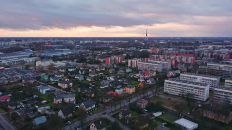 Mixing-private-estates-and-apartment-buildings-in-Riga-suburbs,-aerial-view