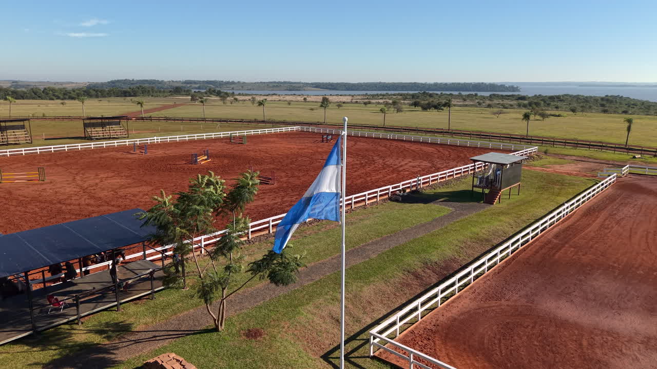 Argentine flag waving in equestrian surfaces