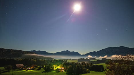 Timelapse-of-low-hanging-cloudscape-over-alpine-village-in-Austrian-alps