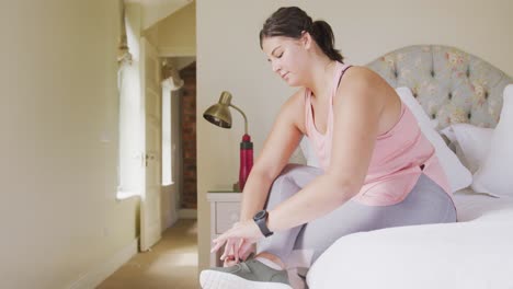 caucasian vlogger woman preparing herself at home.