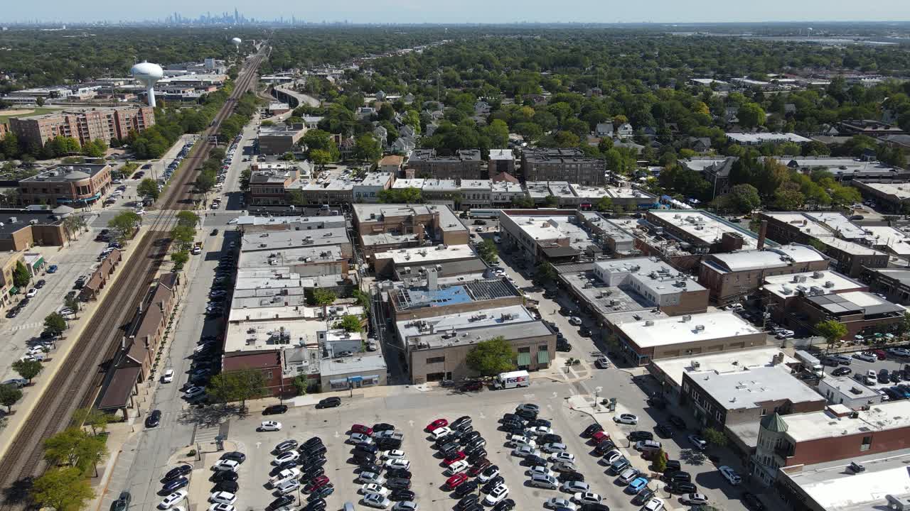 La Grange, IL on a sunny fall day, showcasing streets, buildings, and the suburban landscape With Downtown Chicago in Background. Crane Up Day E
