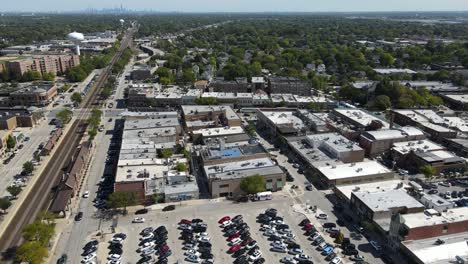 la grange, il on a sunny fall day, showcasing streets, buildings, and the suburban landscape with downtown chicago in background. crane up day e
