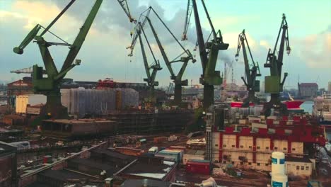 drone flying up to the shipyard