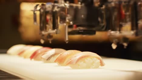 innovative sushi robotics: automated machines skillfully prepare sushi delicacies with precision in a modern culinary experience