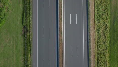 aerial view of a highway with a truck