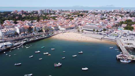 aerial flying away shot from cascais bay area, portugal