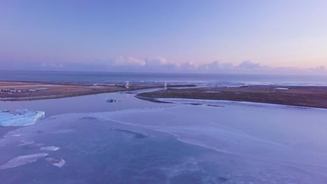 Laguna-Glacial-Puesta-De-Sol-Vuelo-Aéreo-Sobre-La-Capa-De-Hielo-Con-Vista-A-La-Playa-Invierno-Islandia