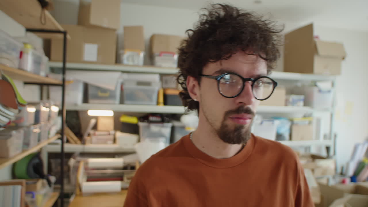 Portrait of Young Man in Office of Delivery Service Company