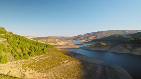 Aerial-over-the-Reservoir-of-Iznájar,-Córdoba,-Spain