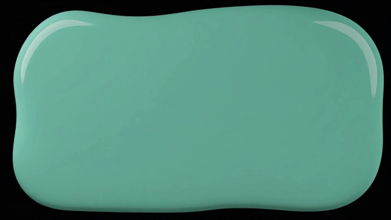 Teal Paint Splatter Spreading on Black Background