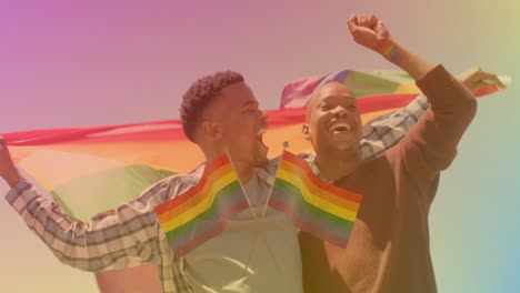 celebrating with rainbow flags, two people smiling over pride animation