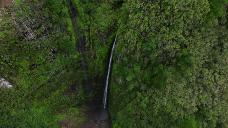 Aerial-Drone-View-Majestic-Waterfall-In-Levada-do-Caldeirao-Verde,-Madeira-Island,-Portugal