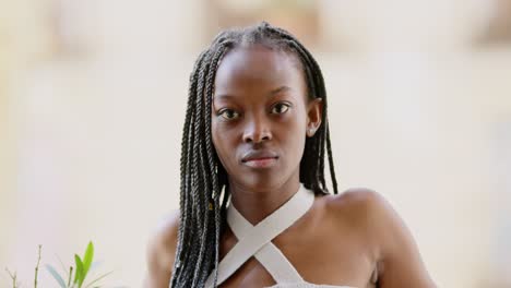 portrait of a young black woman with braids