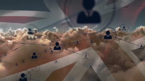 animation of network of connections of icons with people over united kingdom flag and clouds