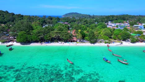 dream beach longtail boats in turquoise water