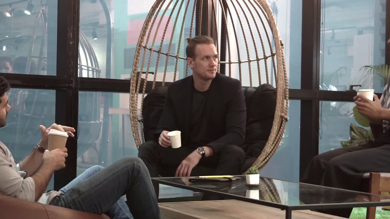 Office worker relax at coffee corner while taking a short break from work.