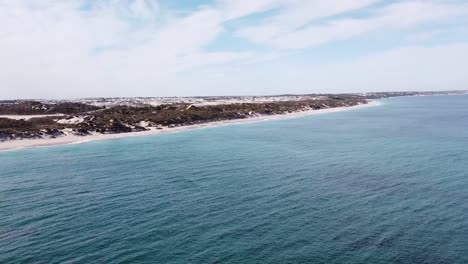 Aerial-view-towards-Eden-Beach-coastline-and-dunes,-Perth-Australia