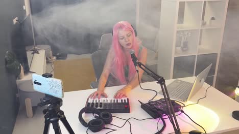 woman recording music in home studio