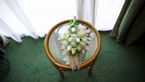 bride's bouquet on the table - top view