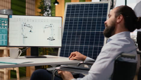 rd researcher with disability in wheelchair studying solar alternative energy