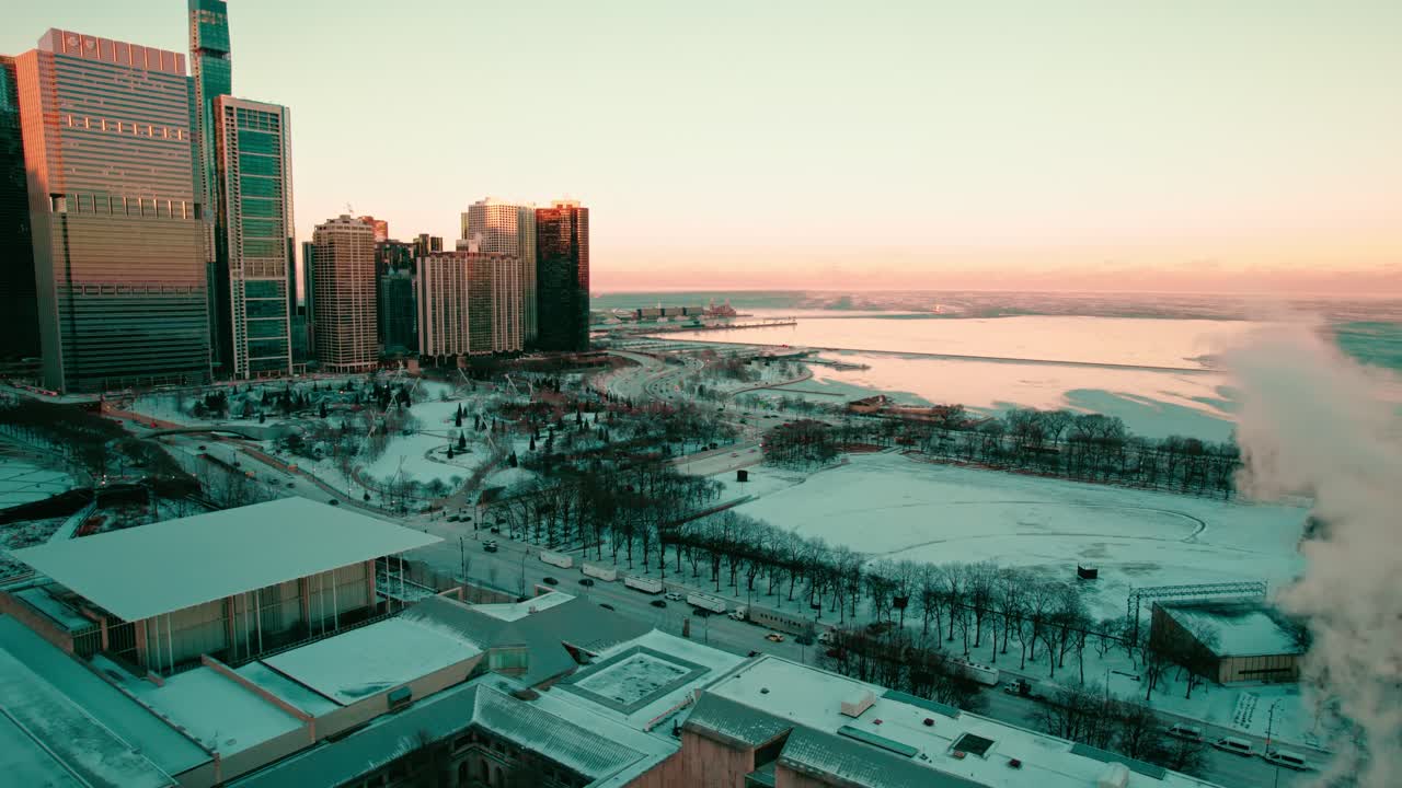 Aerial view of the Chicago skyline on a cold January day, highlighting the city's architecture amidst the frosty atmosphere