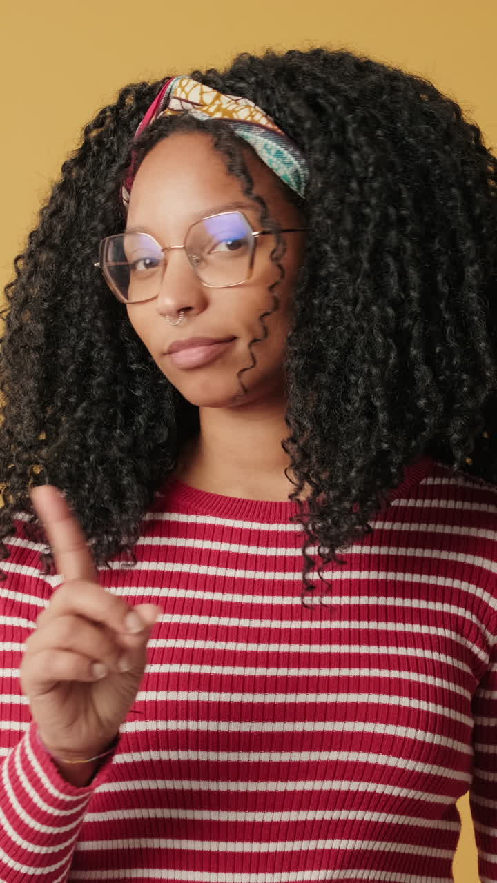 Serious Young Woman Making Stop and No Gestures