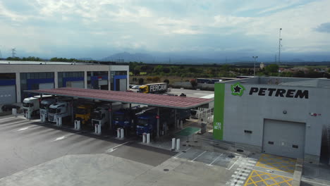 truck stop with multiple trucks