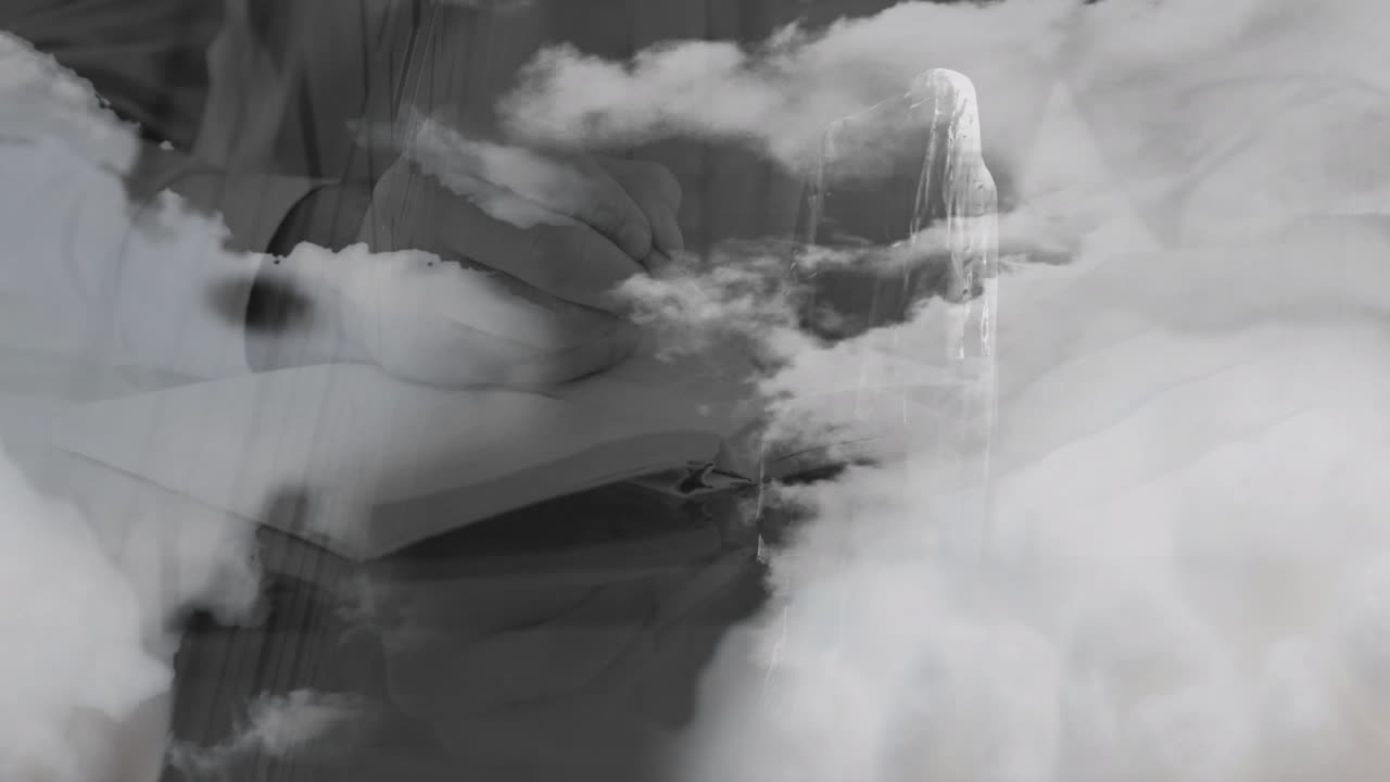 Hand writing in notebook with animation of clouds and waterfall in school