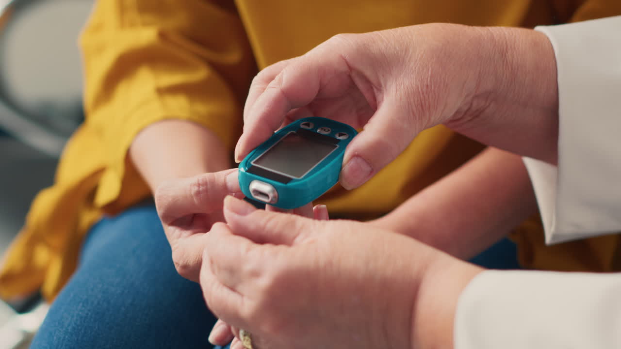 Medical examination with a doctor checking patient's hands