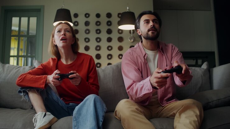 Couple Playing Video Games at Home