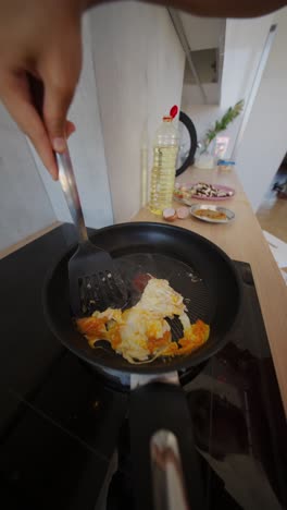 cooking eggs in a pan