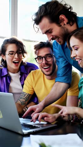 a young business team in a focused discussion at work.