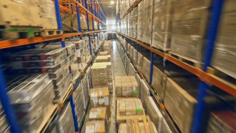 fpv flight inside merchandise warehouse with racking system in dominican republic