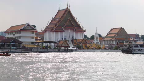 wat kalayanamit temple by the river in bangkok