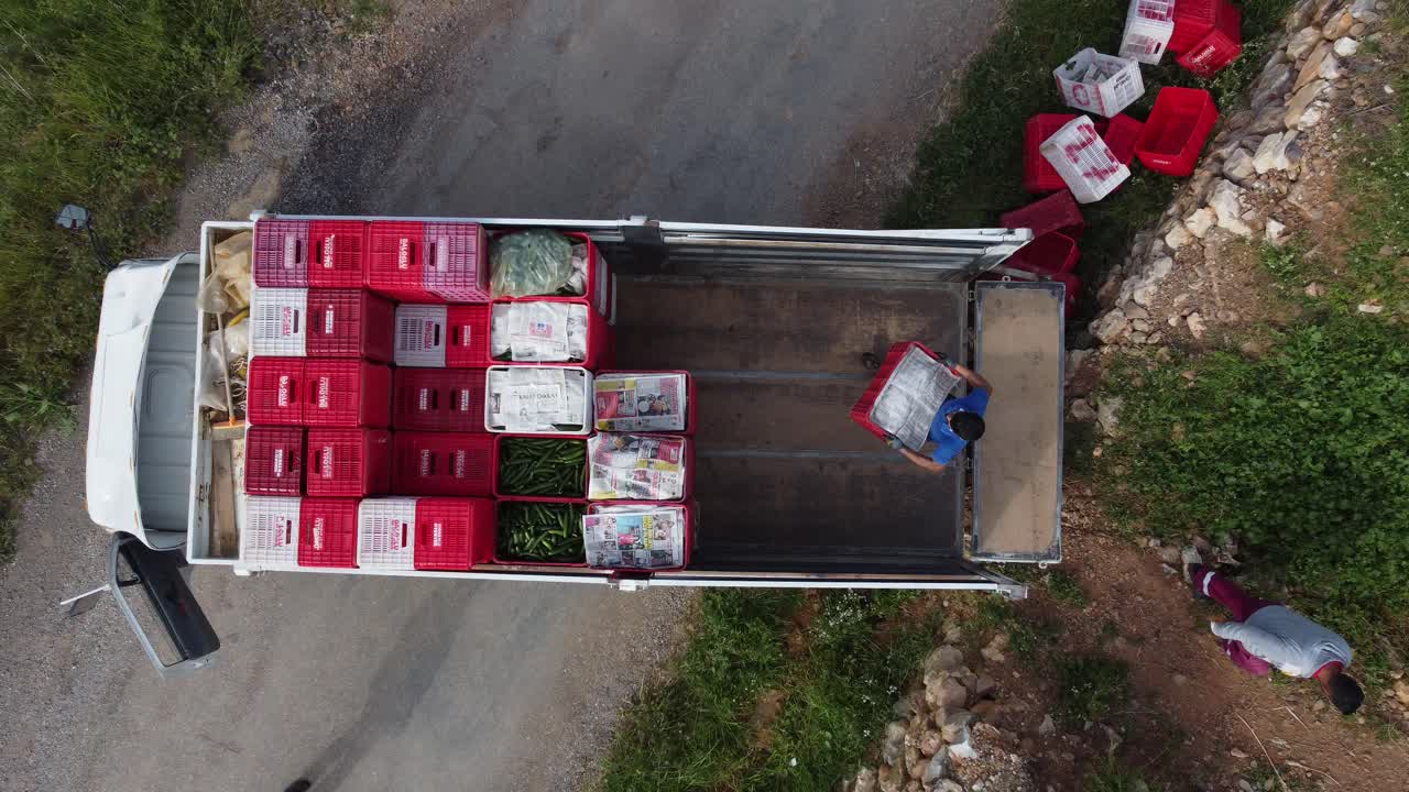 Sera Workers Loading Products Truck