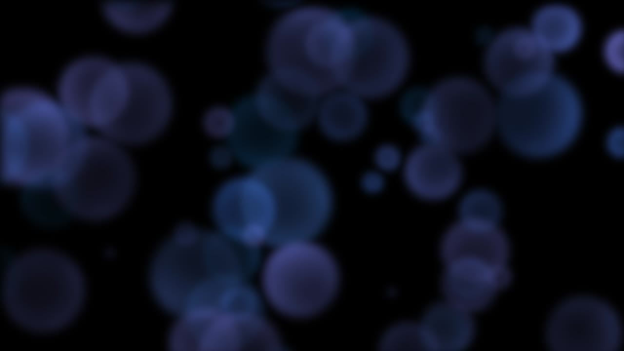 partículas azules voladoras y bokeh redondo en fondo oscuro