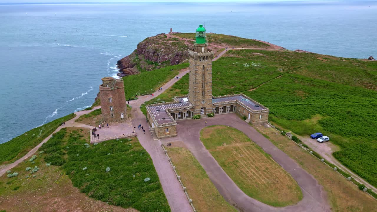 Bird's eye drone movement of the Cap Fréhel peninsula with lighthouse complex as historical monument, Côtes-d'Armor, Brittany, France.