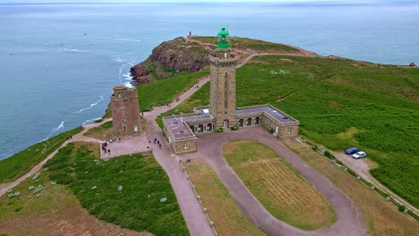 bird's eye drone movement of the cap fréhel peninsula with lighthouse complex as historical monument, côtes-d'armor, brittany, france.