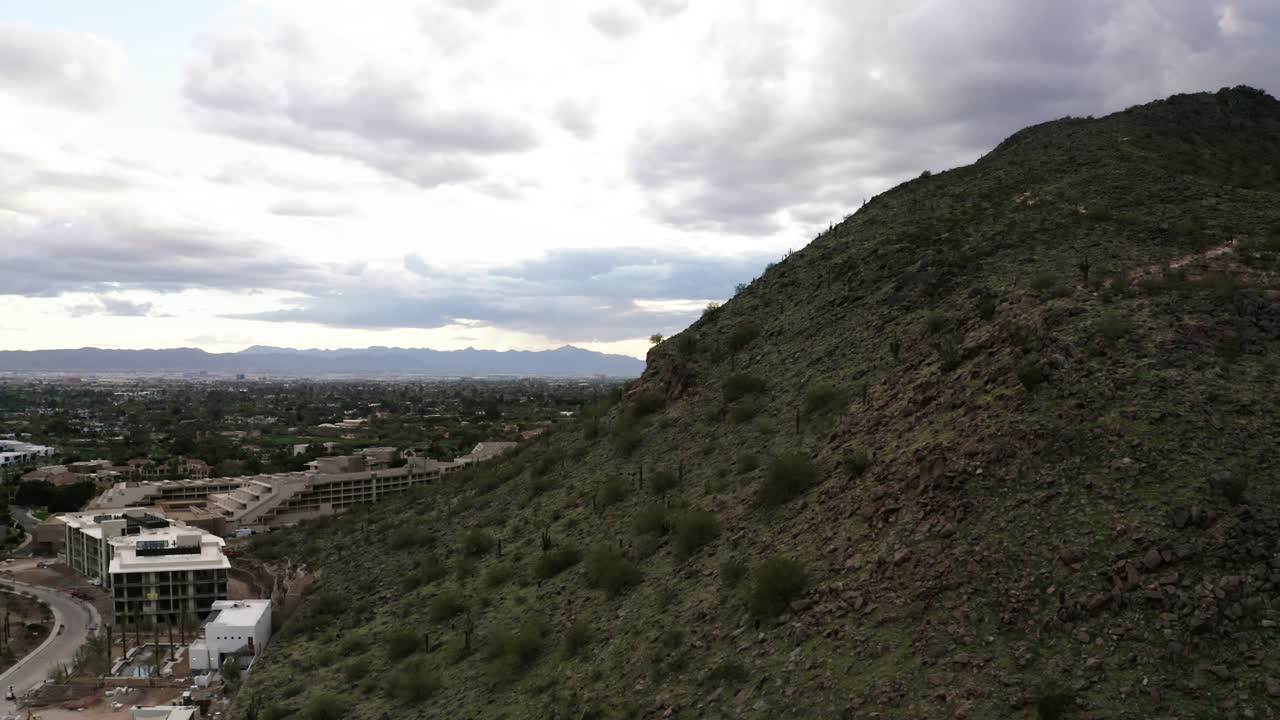 Drone shot revealing The Phoenician, a luxury hotel, near Camelback Mountain
