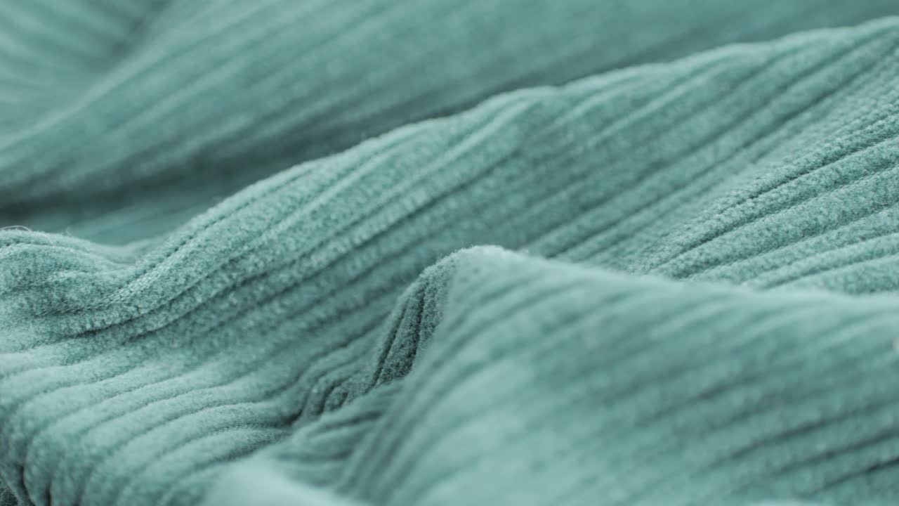 Velvet textile cloth texture close-up macro. Fashion fabric multicolor. Velvet vintage clothes.High quality 4k footage