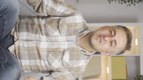 Vertical-video-of-Happy-man-dancing-to-the-camera.