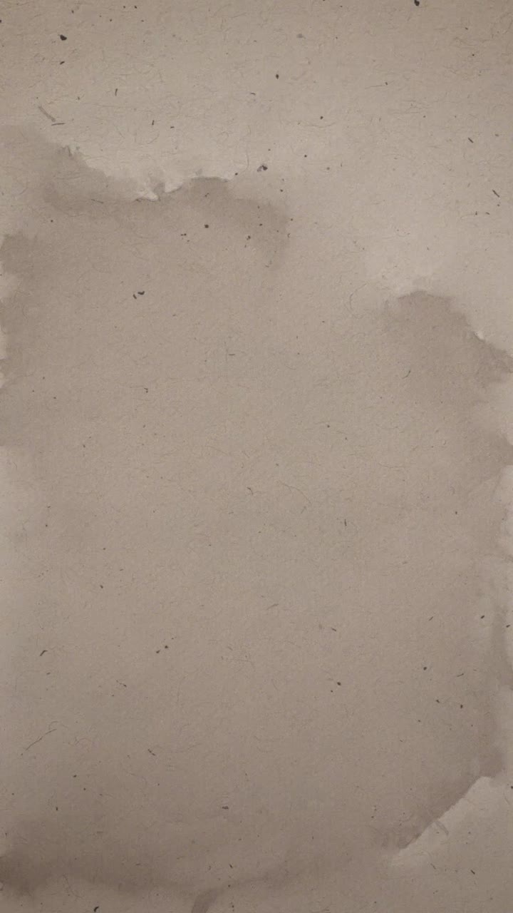 Abstract Water Stains Spreading on Textured Paper Background