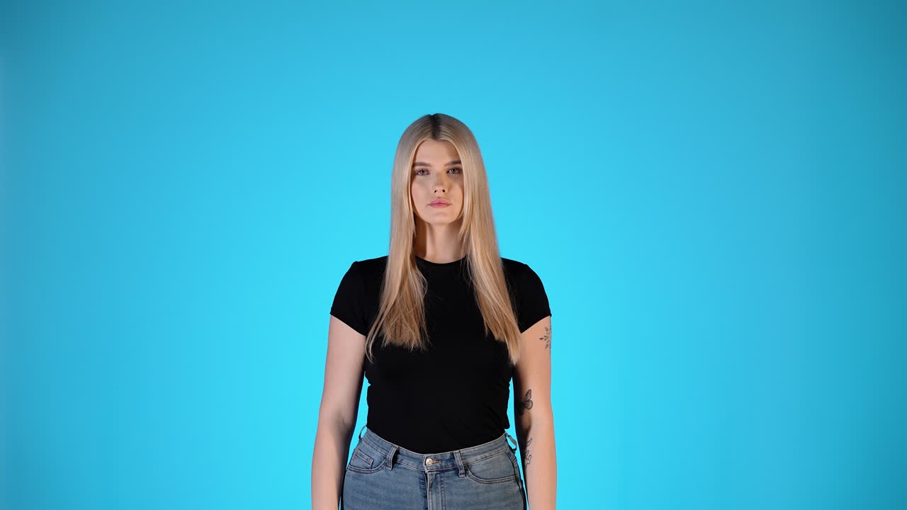 Young Blonde Woman Shrugging Gesture, Thinking and Doubtful, Colorful Studio Portrait