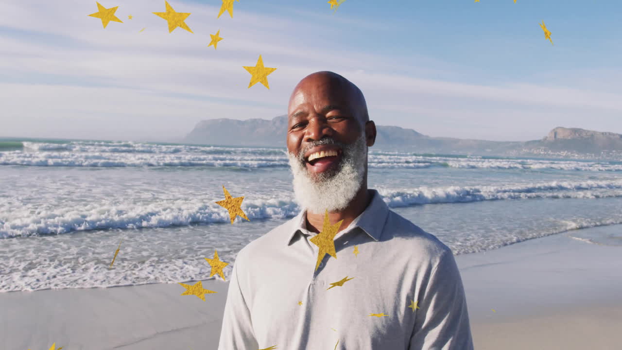 Man smiling on beach while engaging with golden star graphics, showcasing technology innovation