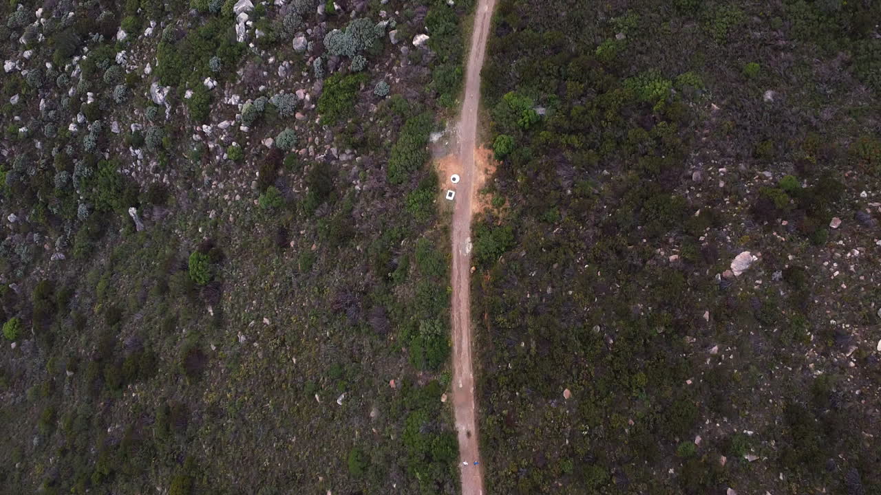 Aerial view of a road through a natural landscape
